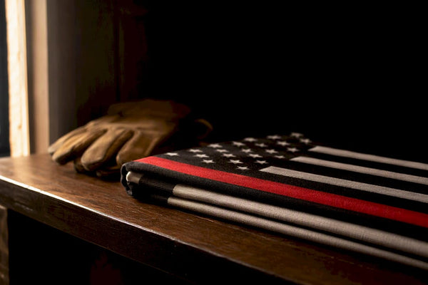 Black white textile with red stripe