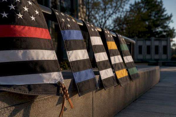 Cropped tribute flag stripes in memorial courtyard