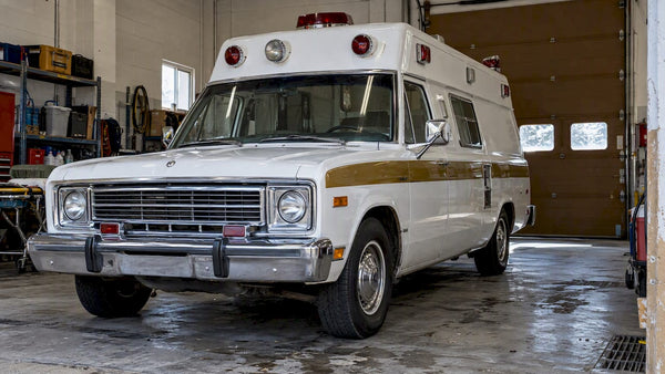 1970s ambulance inside a municipal garage