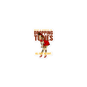 A die-cut sticker featuring an illustration of a woman in a red dress and heels with the text 'BRASS & BUNKER CO. DROPPING TONES' and 'ALL GRIT, NO QUIT.
