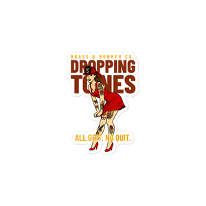 A die-cut sticker featuring a retro-style pin-up illustration with the text 'BRASS & BUNKER CO. DROPPING TONES' and 'ALL GRIT, NO QUIT.