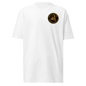 A white short-sleeve crewneck t-shirt with a circular black and gold graphic printed on the left chest, displayed on a clean white background.