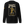 Black crewneck sweatshirt shown from the back, featuring a large graphic print of a firefighter in yellow turnout gear with the text 'SALTY BY TRADE' and 'WHEN IT FLOWS IT POURS'. A small yellow striped detail is visible on the left sleeve.