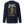 A navy blue crewneck sweatshirt shown from the back, featuring a large graphic print of a firefighter in yellow and white with the text 'SALTY BY TRADE WHEN IT FLOWS IT POURS' and 'BRASS & BUNKER CO'. A small yellow stripe detail is visible on the left sleeve.